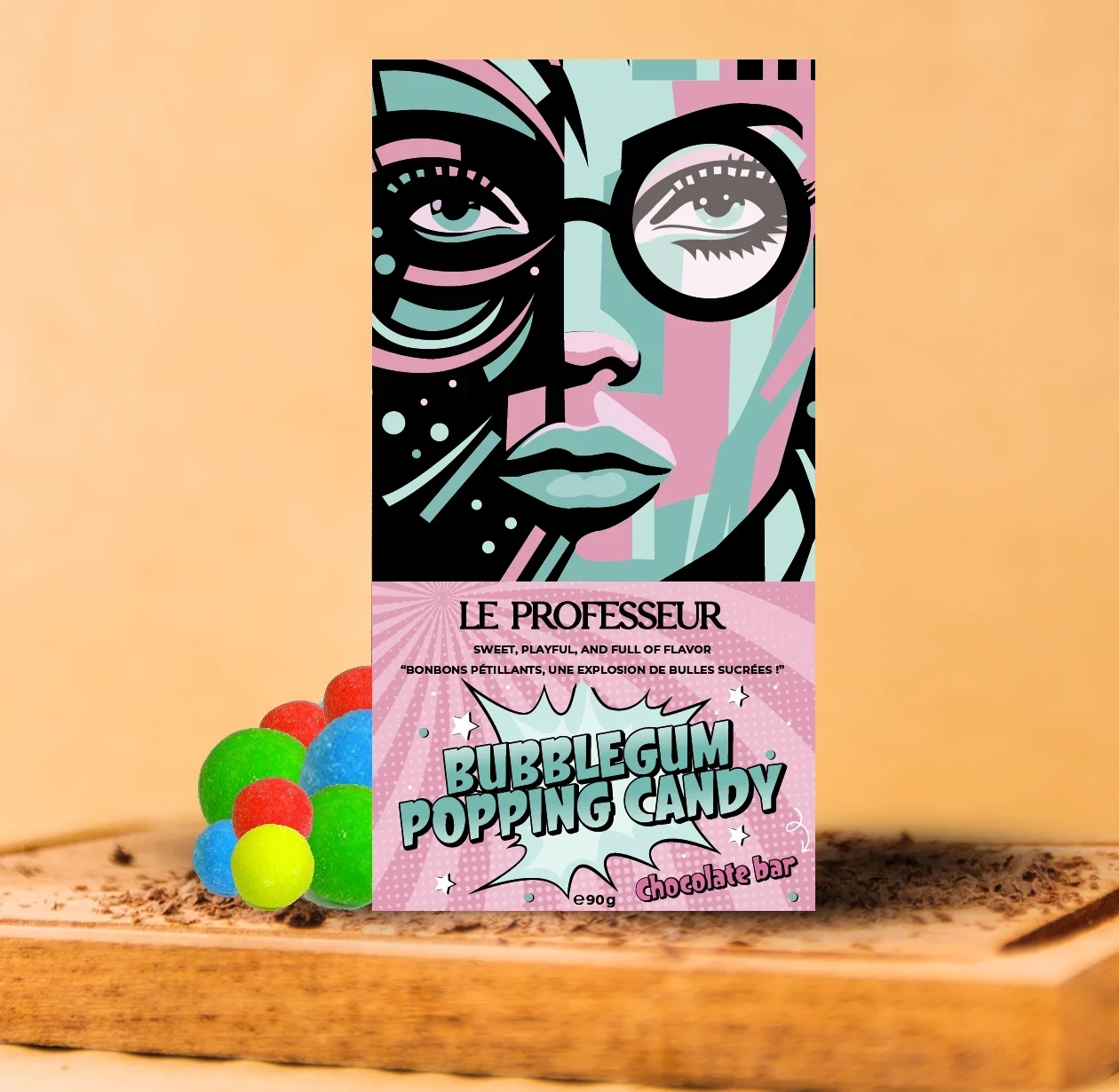 Le Professeur Bubblegum Popping Candy chocolate bar with vibrant pop-art packaging and colorful candy bubbles.
